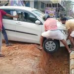 നിര്‍മ്മാണ പ്രവര്‍ത്തികള്‍ നടക്കുന്ന ഠാണാ-ചന്തക്കുന്ന് റോഡില്‍ ബിഷപ്സ് ഹൗസിന് മുമ്പിലെ കാനയിലേക്ക് നിയന്ത്രണം വിട്ട കാര്‍ അപകടത്തില്‍പ്പെട്ടു